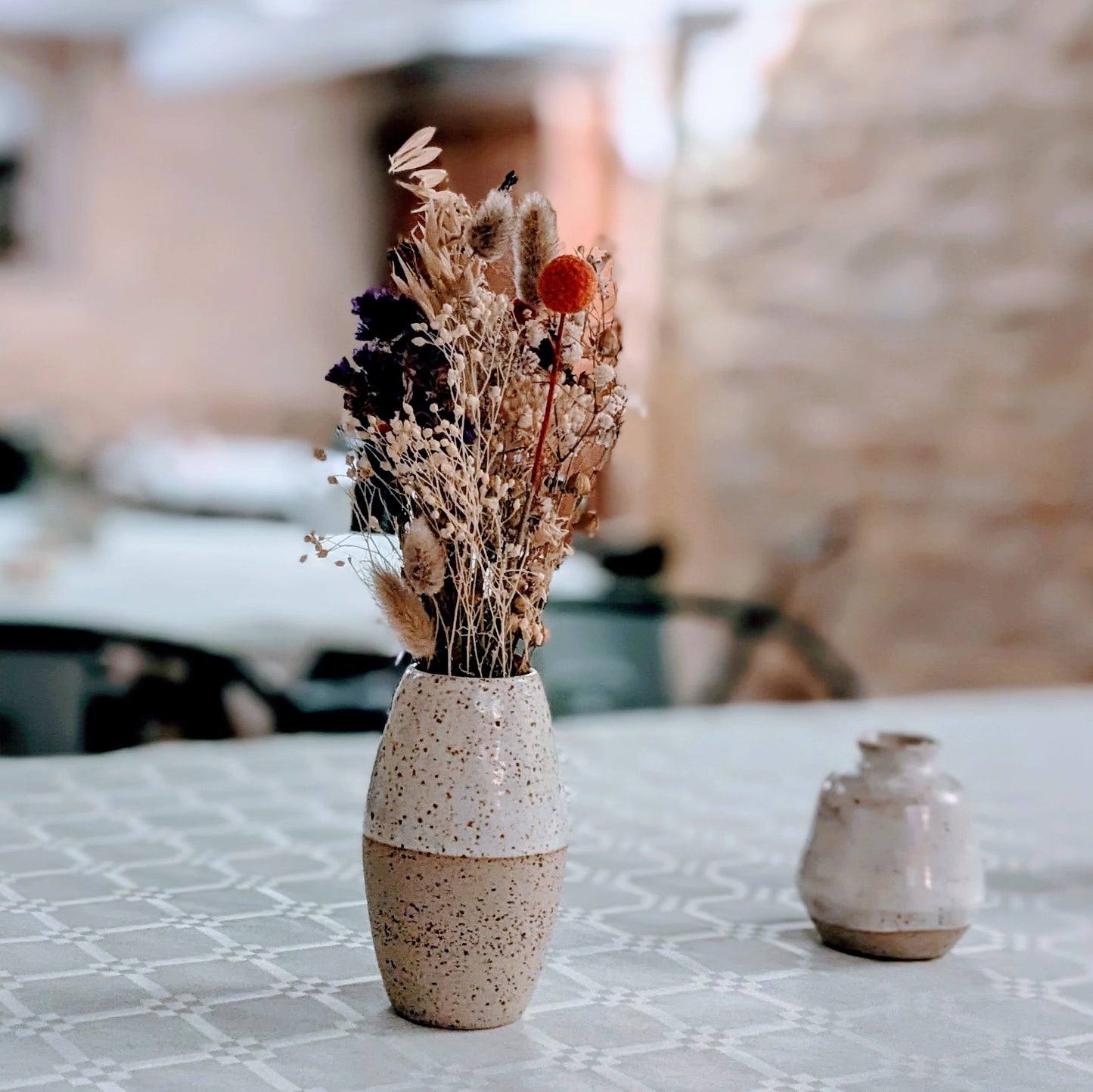 Vase granit et fleurs séchées